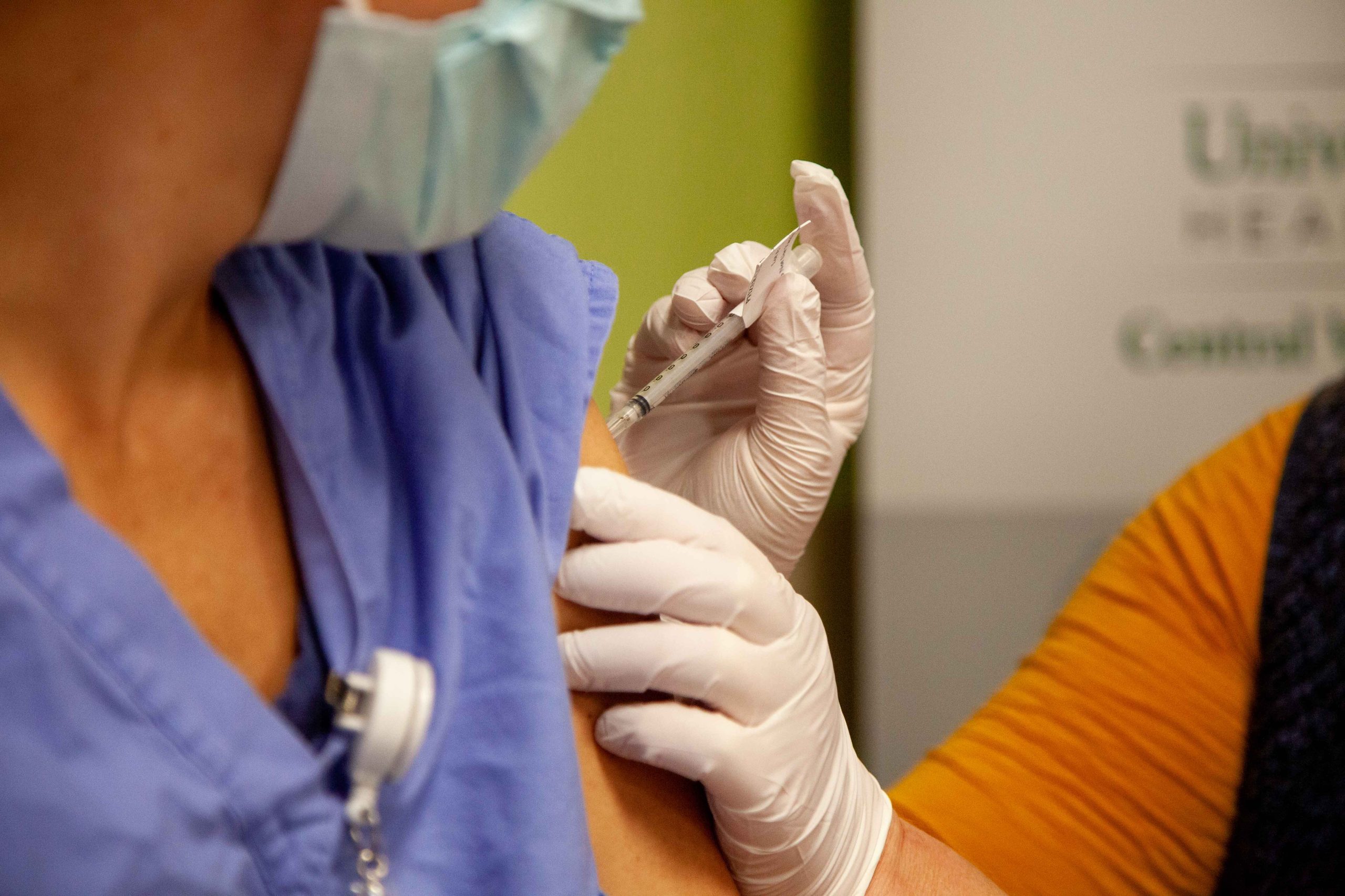 nurse receiving injection