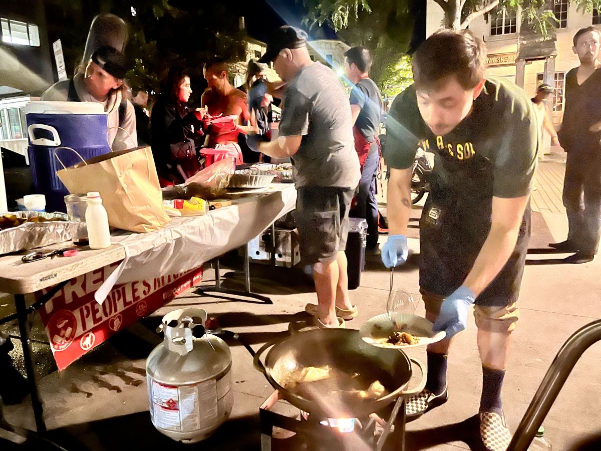 Food as protest: People’s Kitchen serves free hot meals downtown in solidarity with Food Not Cops 